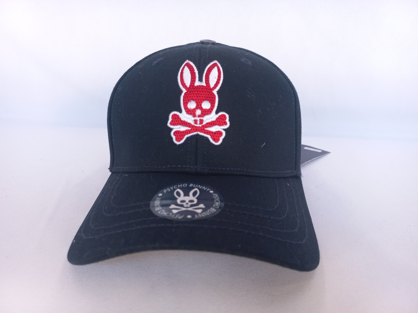 Gorra negra Psycho Bunny